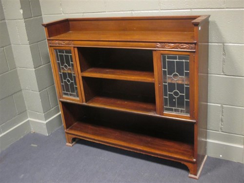 Lot 444 - An early 20th century lead glazed mahogany...