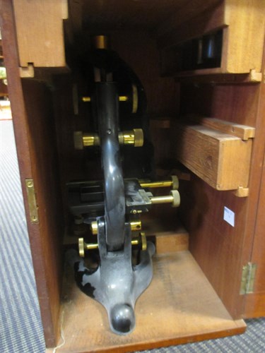 Lot 121 - A mahogany cased Watson microscope