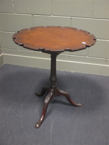 Lot 397 - A George III mahogany tripod table, 68cm high