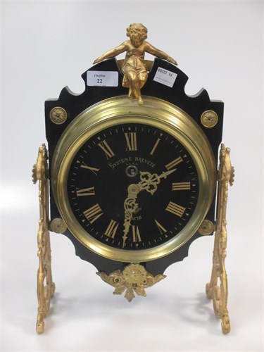 Lot 22 - A French gilt metal and ebonised timepiece