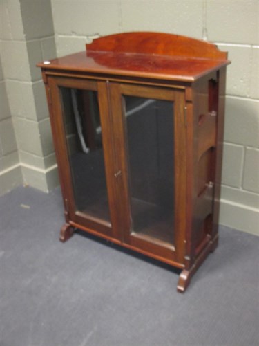 Lot 361 - An Edwardian mahogany bookcase and a mahogany...