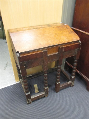 Lot 370 - A James II oak scriptor, with bobbin turned...