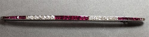 Lot 190 - A French Art Déco diamond and synthetic ruby...