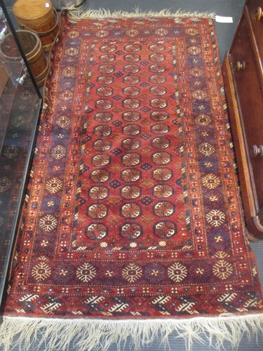 Lot 466 - A Bokhara rug, 200cm (79in) x 113cm(44.5in)...