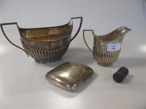 Lot 199 - A silver cigarette case, cream jug & sugar...