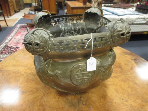 Lot 137 - A large Chinese brass planter, 30cm high