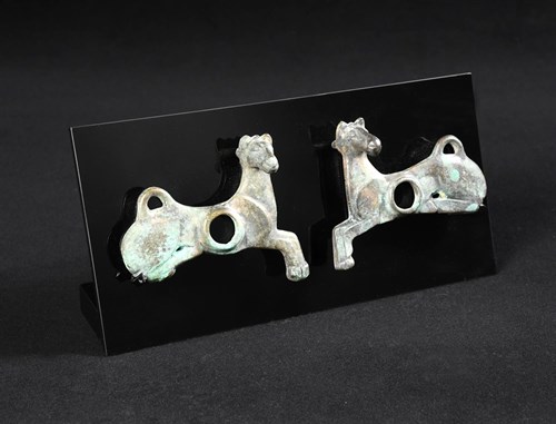 Lot 25 - A pair of Luristan horse bit plaques, 8th century BC