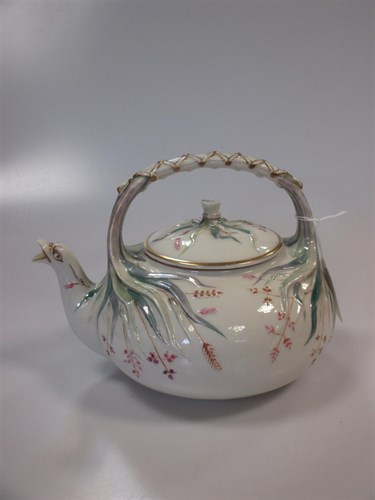 Lot 7 - A first period Belleek grass pattern teapot...