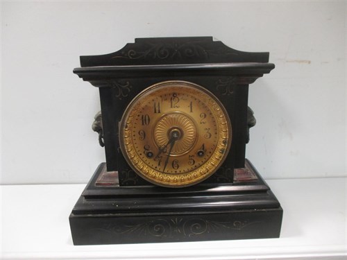Lot 111 - A slate mantel clock by Ansonia dated 1882,...