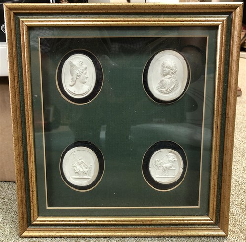 Lot 316 - A framed group of four 19th century Grand Tour intaglios