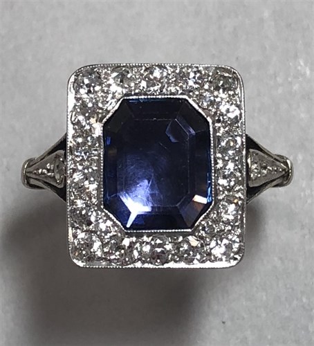 Lot 280 - A sapphire and diamond cluster 'poison' ring