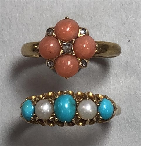 Lot 325 - A coral and diamond quatrefoil ring together with a turquoise and pearl five stone ring