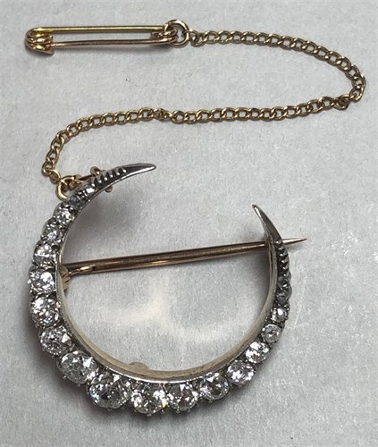 Lot 451 - A late 19th century diamond closed crescent brooch