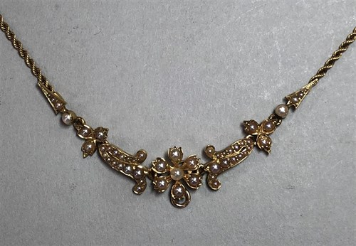 Lot 377 - A seed pearl flower and ropetwist chain necklace