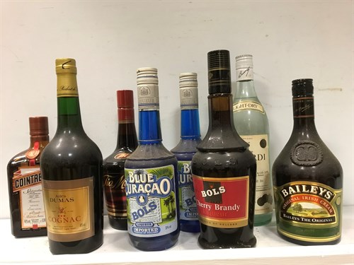 Lot 117 - Spirits and liqueurs. Bols Blue Curacao (2),...
