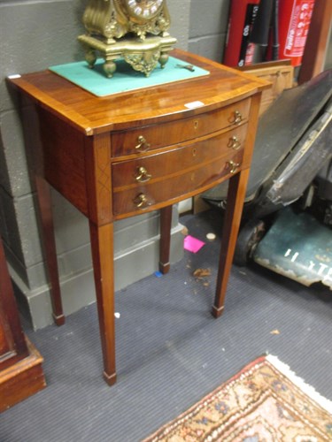 Lot 421 - A mahogany three drawer side table 76 cm high