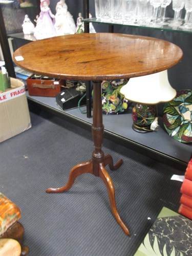 Lot 338 - A George III mahogany tripod table