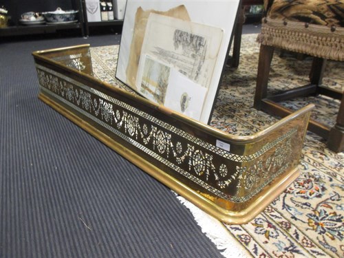 Lot 341 - A brass fender, (internal size 119 x 31cm)