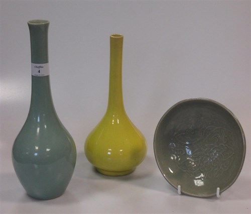 Lot 4 - Two Chinese yellow ground bottle vases and a...