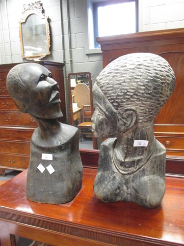 Lot 141 - A pair of African hardwood busts, both approx...