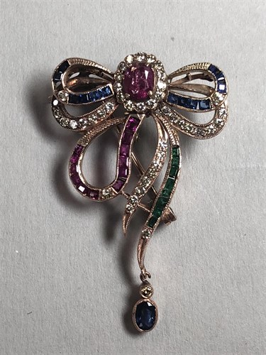 Lot 453 - A diamond and gemset ribbon brooch / earpendant