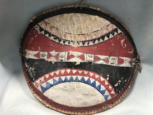 Lot 251 - A tribal shield and a spear, possibly Masai