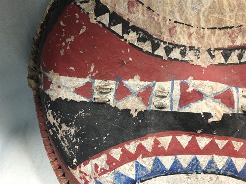 Lot 251 - A tribal shield and a spear, possibly Masai
