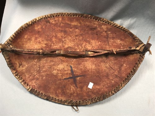 Lot 251 - A tribal shield and a spear, possibly Masai