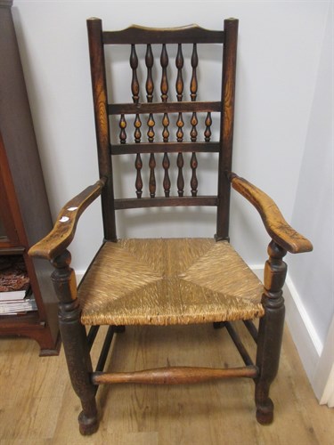 Lot 443 - Three Lancashire spindle chairs (3)