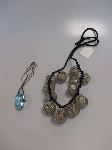 Lot 184 - A silver bobble necklace and a blue glass...