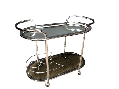 Lot 282 - A 1970's chrome two-tier drinks trolley, with...