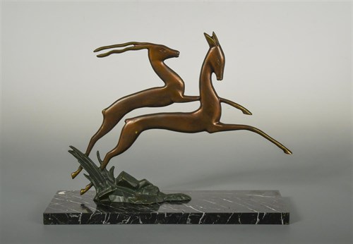 Lot 67 - An Art Deco bronze model of two gazelles