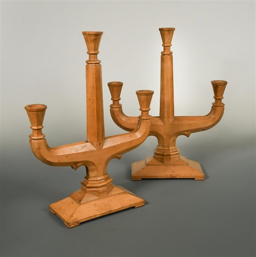 Lot 144 - A pair of Cotswold School sycamore three-branch candelabra