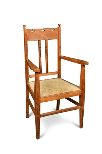 Lot 217 - An Arts & Crafts oak elbow chair