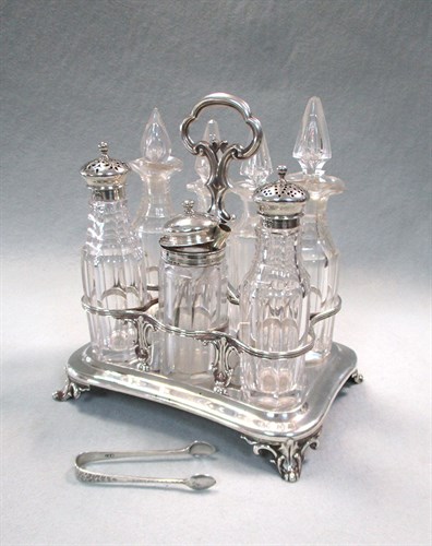 Lot 82 - A Victorian silver 7 bottle cruet, and a pair of miniature sugar nips