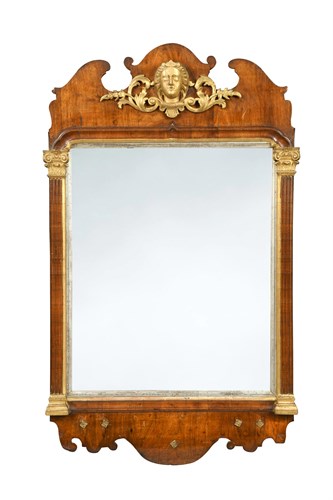 Lot 389 - An 18th century parcel gilt framed walnut mirror
