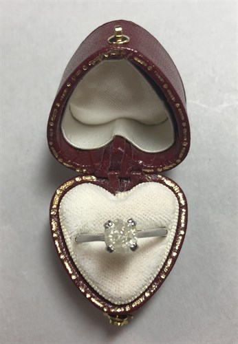 Lot 210 - A single stone certificated diamond ring set in 18ct gold