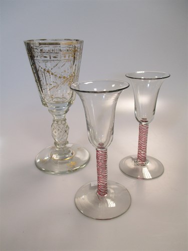 Lot 2 - A pair of short stemmed drinking glasses and...