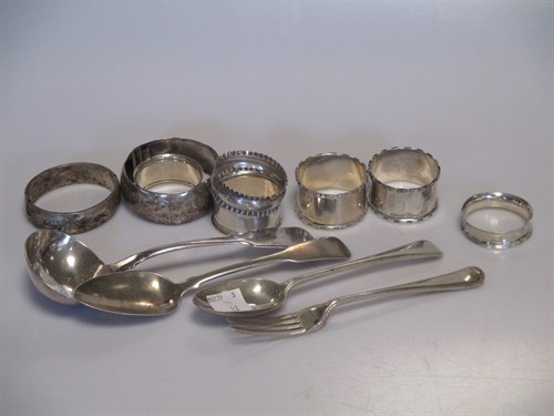 Lot 204 - Six silver napkin rings, some silver flatware...