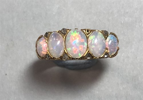 Lot 349 - An opal and diamond ring set in 18ct gold