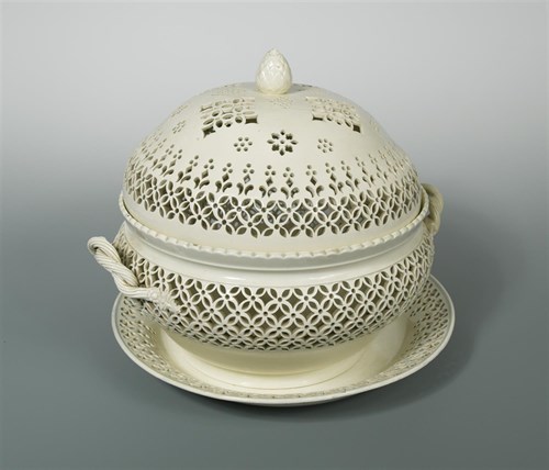 Lot 1 - A large Leeds creamware chestnut basket, cover and stand, circa  1775