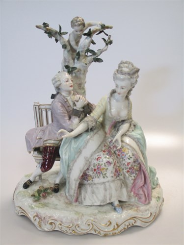 Lot 22 - A German porcelain figural group depicting a...
