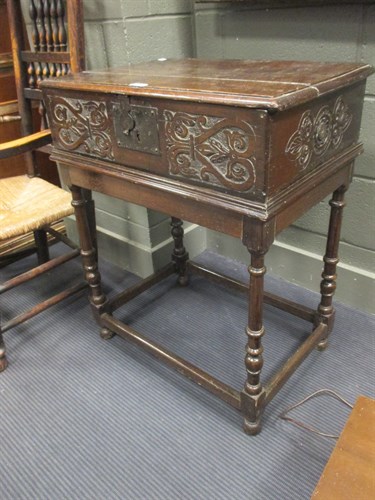 Lot 447 - A late 17th century carved oak Bible box on a...