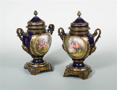 Lot 29 - A pair of 19th century Sevres style two handled vases and covers