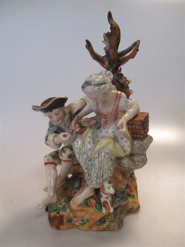 Lot 11 - A Meissen style figural group of a courting...