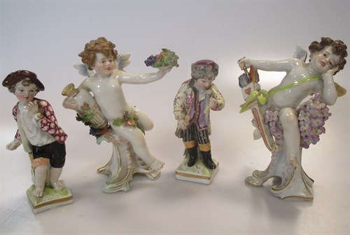 Lot 13 - A pair of Meissen figures of winged cherubs...