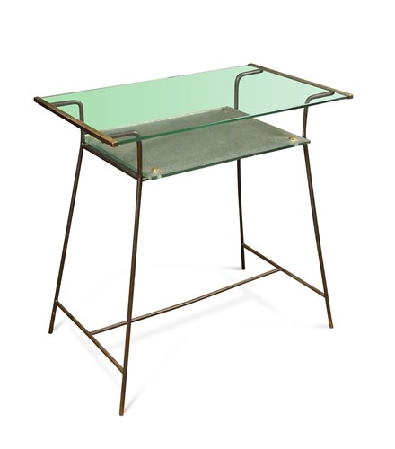 Lot 265 - A mid-20th century iron and brass writing desk