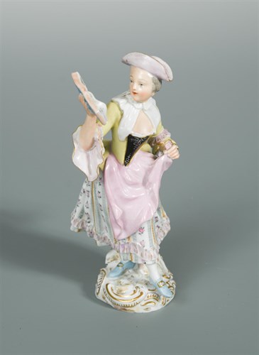 Lot 27 - A late 19th century Meissen figure of a lady singing