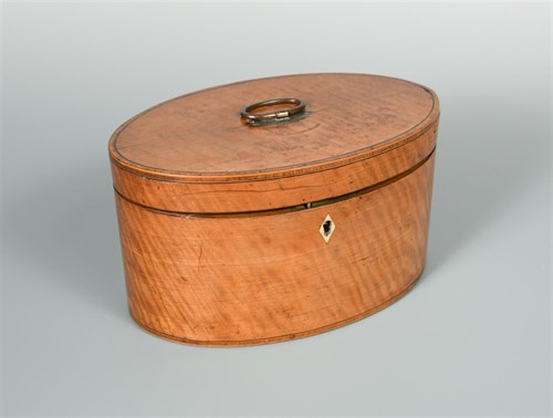 Lot 316 - A George III oval satinwood tea caddy