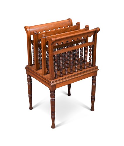 Lot 198 - Liberty & Co., a Moorish style walnut canterbury